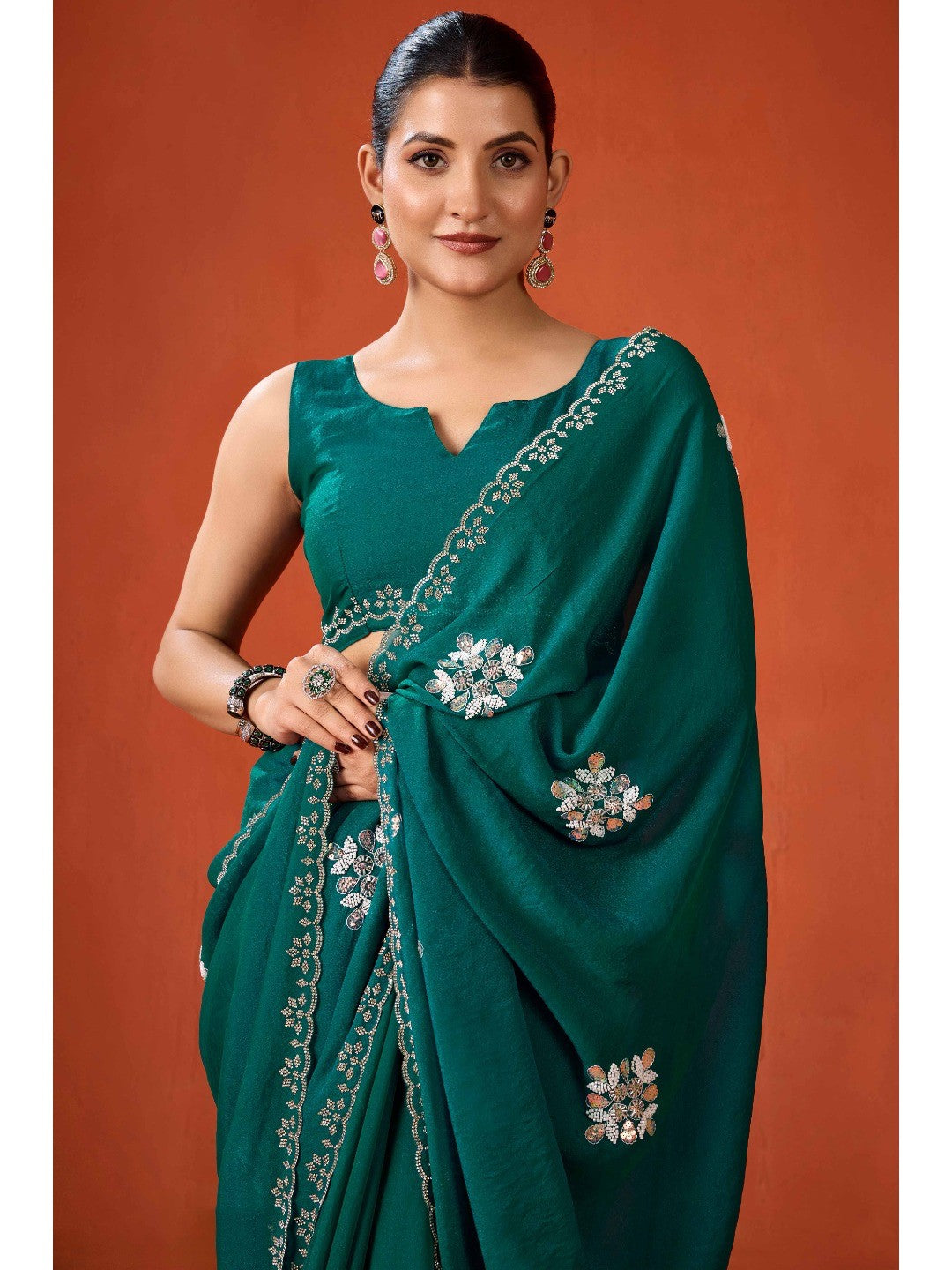 Graceful Teal Green Georgette Silk Saree Adorned with Floral Embellishments - Image 3