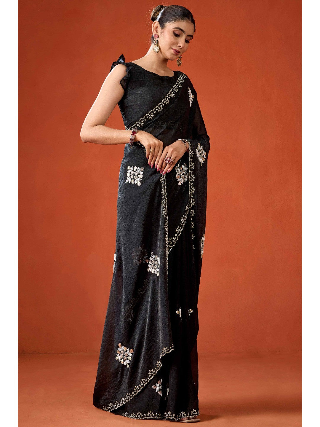 Graceful Black Georgette Silk Saree Adorned with Floral Embellishments - Image 4