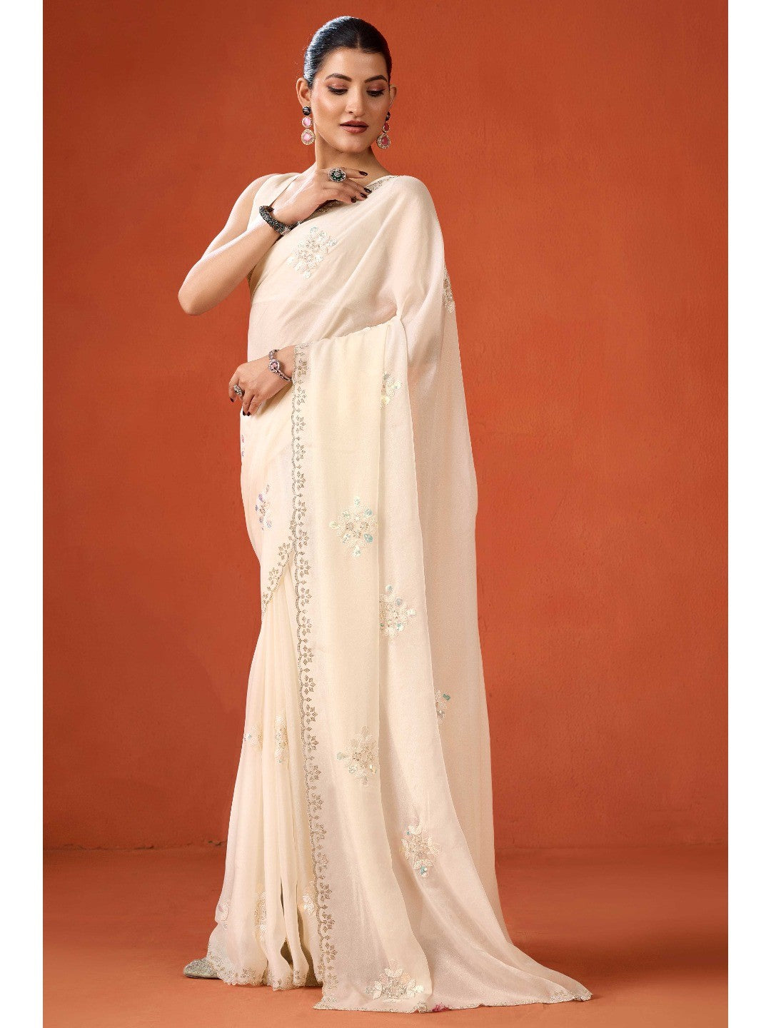 Graceful Offwhite Georgette Silk Saree Adorned with Floral Embellishments - Image 3