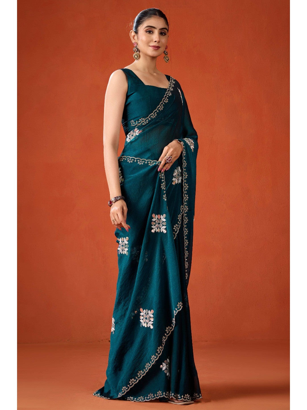Graceful Teal Georgette Silk Saree Adorned with Floral Embellishments - Image 4