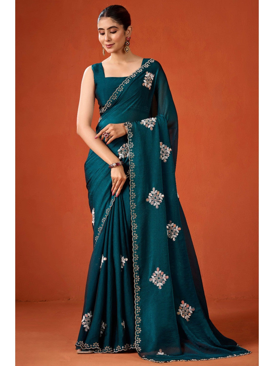 Graceful Teal Georgette Silk Saree Adorned with Floral Embellishments - Image 6