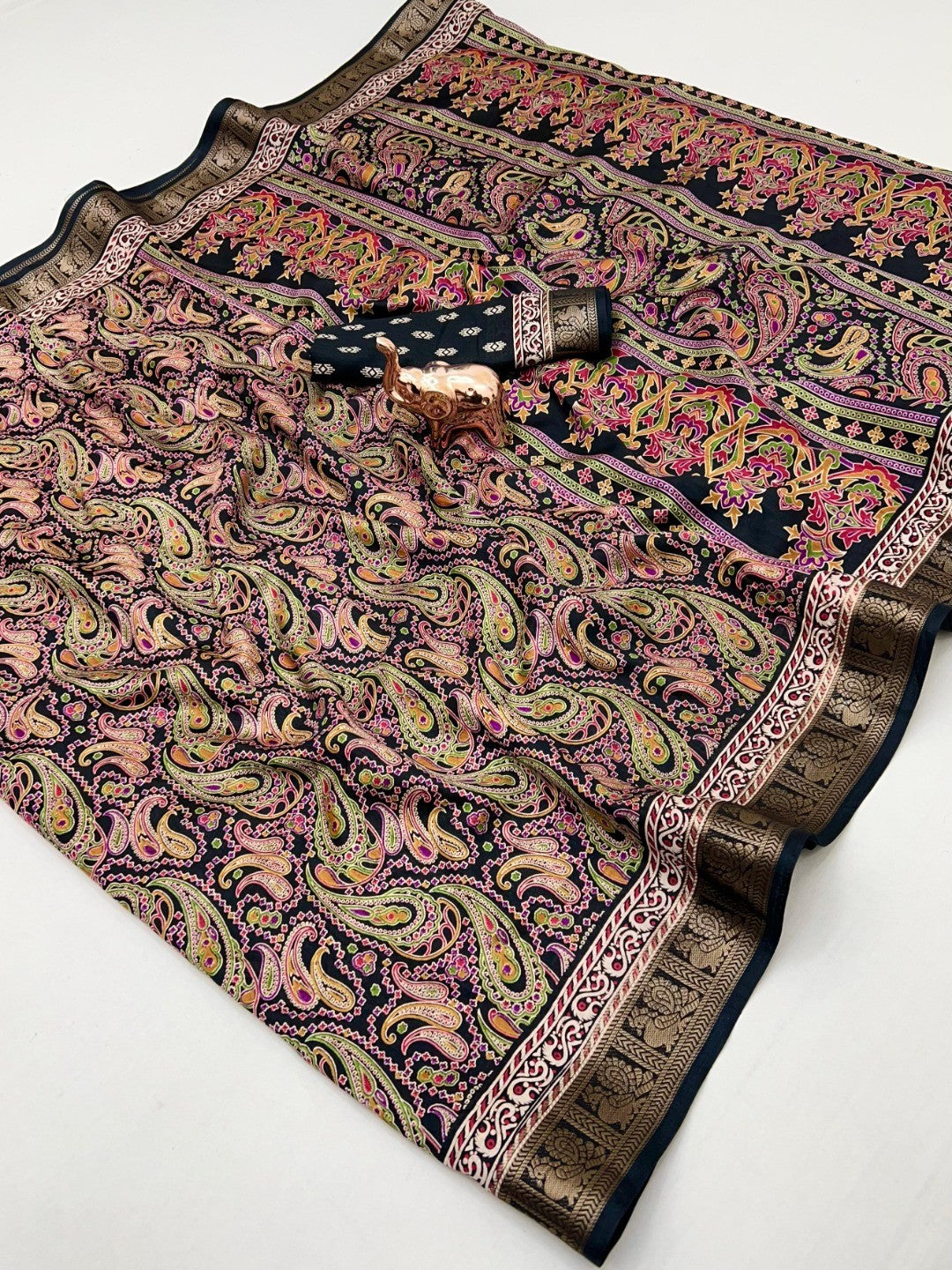 Black Paisley Printed Dola Silk Saree with Detailed Zari Border and Graceful Fluid Drape - Image 1