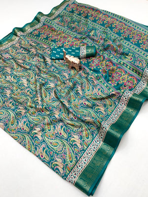 Rama Green Paisley Printed Dola Silk Saree with Detailed Zari Border and Graceful Fluid Drape - Image 1