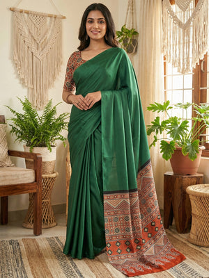 Green Crepe Saree with Heritage Inspired Ajrakh Pallu and Smooth Silky Texture Finish - Image 1