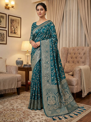 Luxurious Teal Blue Floral Weaving Dola Silk Saree With Handcrafted Tassel Pallu Finish - Image 1