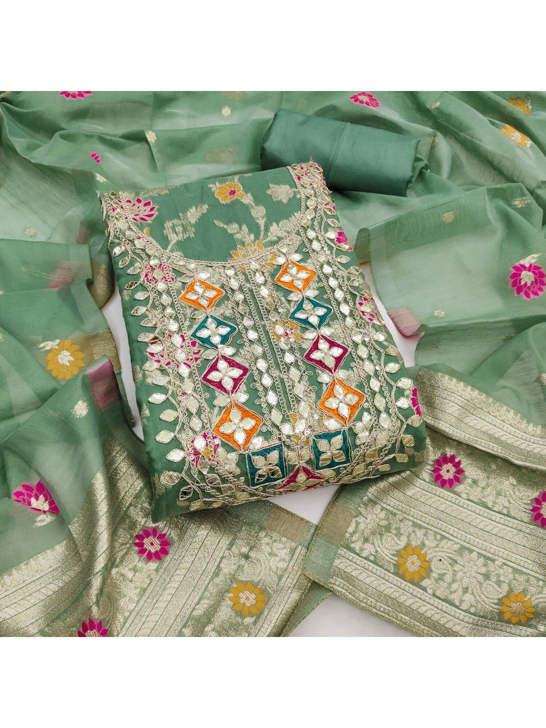 Elegant Green Floral Weave Banarasi Silk Dress Material With Sequins Embroidered Accents - Image 1