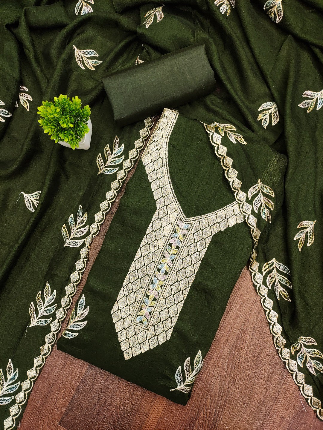 Graceful Green Leaf Motif Embroidered Vichitra Silk Dress Material With Intricate Detailing - Image 1