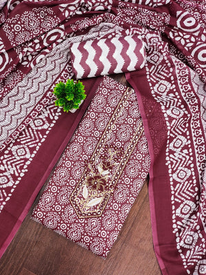 Classic Wine Printed Cotton Blend Dress Material Highlighted With Delicate Floral Embroidery On Neck - Image 1
