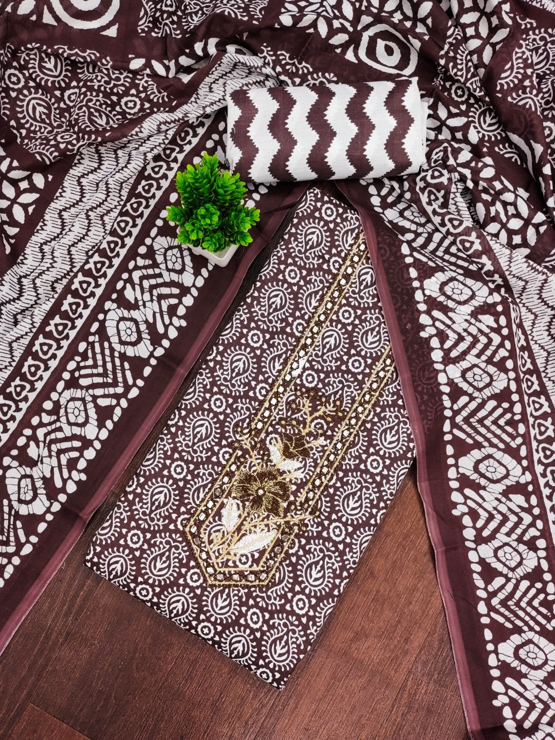 Classic Brown Printed Cotton Blend Dress Material Highlighted With Delicate Floral Embroidery On Neck - Image 1
