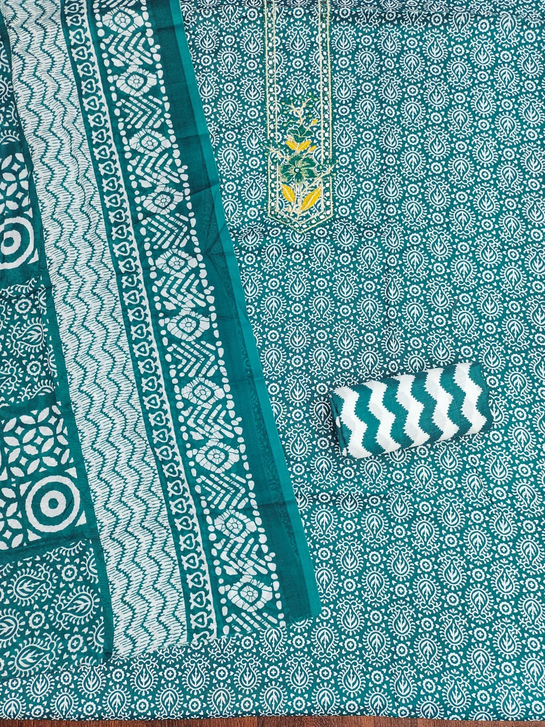 Classic Teal Printed Cotton Blend Dress Material Highlighted With Delicate Floral Embroidery On Neck - Image 4