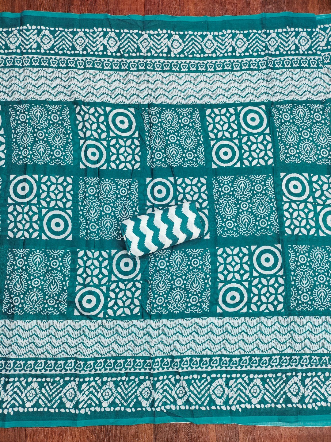Classic Teal Printed Cotton Blend Dress Material Highlighted With Delicate Floral Embroidery On Neck - Image 2