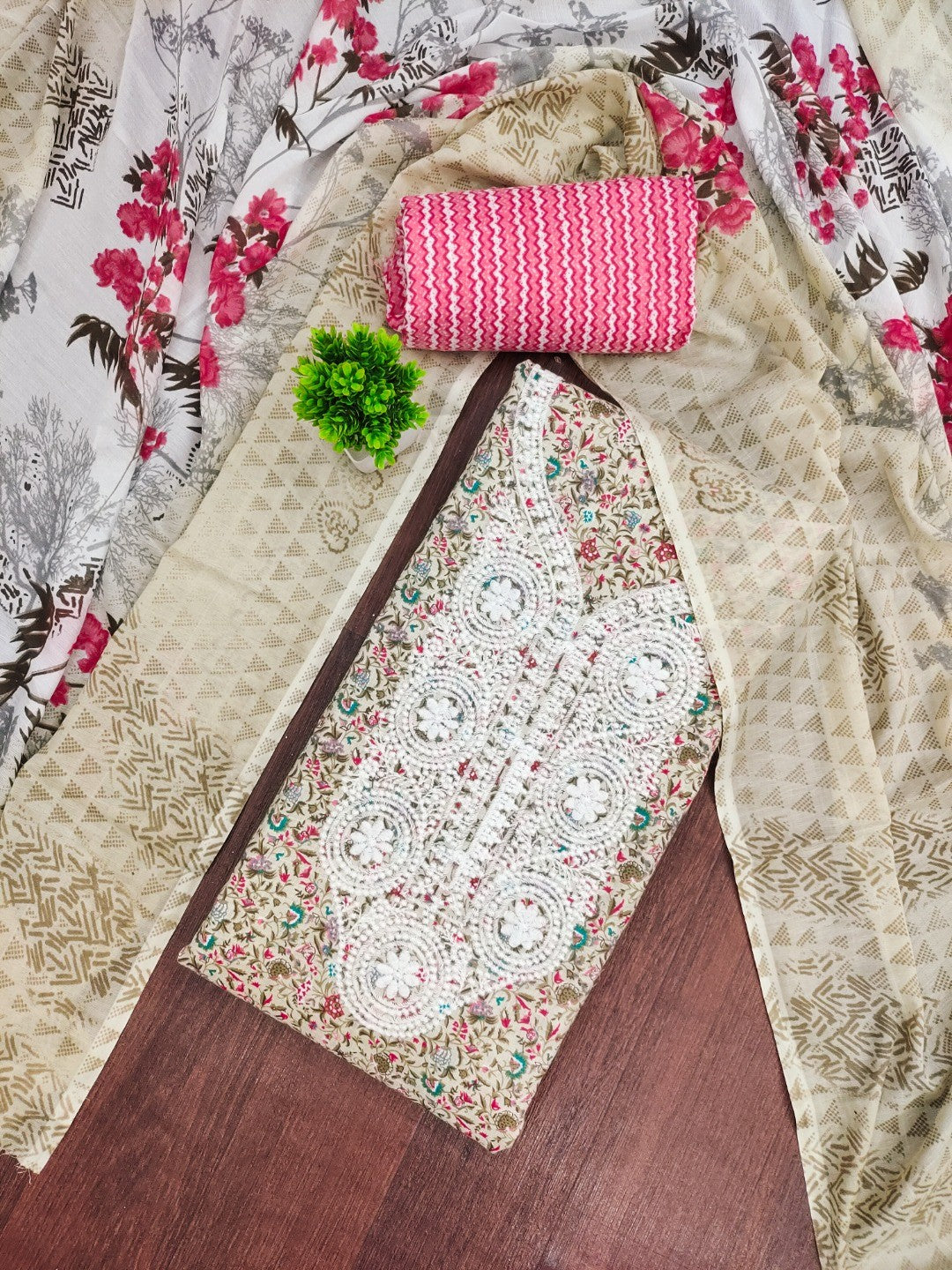 Stylish Cream & Gajari Pink Floral Printed Cotton Blend Dress Material With Embroidery Neck Work - Image 1