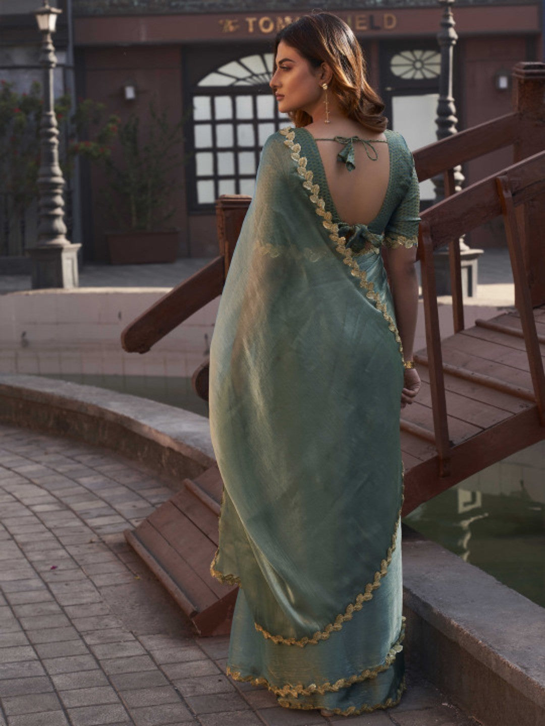 Sea Green Chiffon Saree with Flowing Drapes and a Delicate Handwoven Golden Zari Border - Image 2