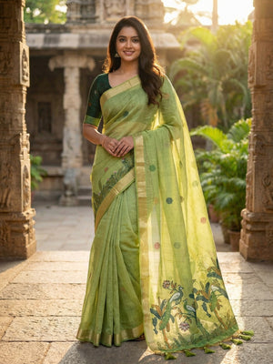 Green Soft Cotton Silk Saree Featuring Delicate Floral Weaving - Image 1