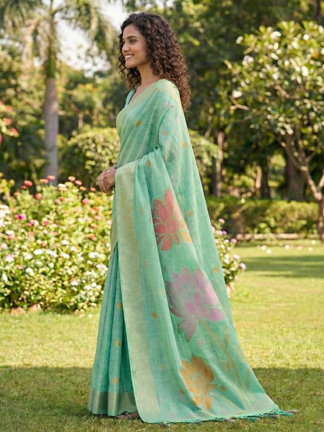 Refreshing Turquoise Linen Cotton Saree Highlighted With Delicate Floral Weaving & Tassel Pallu - Image 2