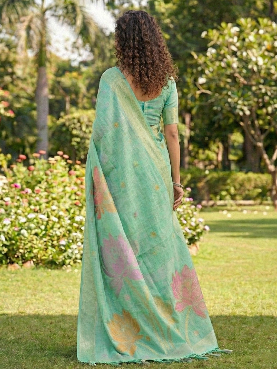 Refreshing Turquoise Linen Cotton Saree Highlighted With Delicate Floral Weaving & Tassel Pallu - Image 3