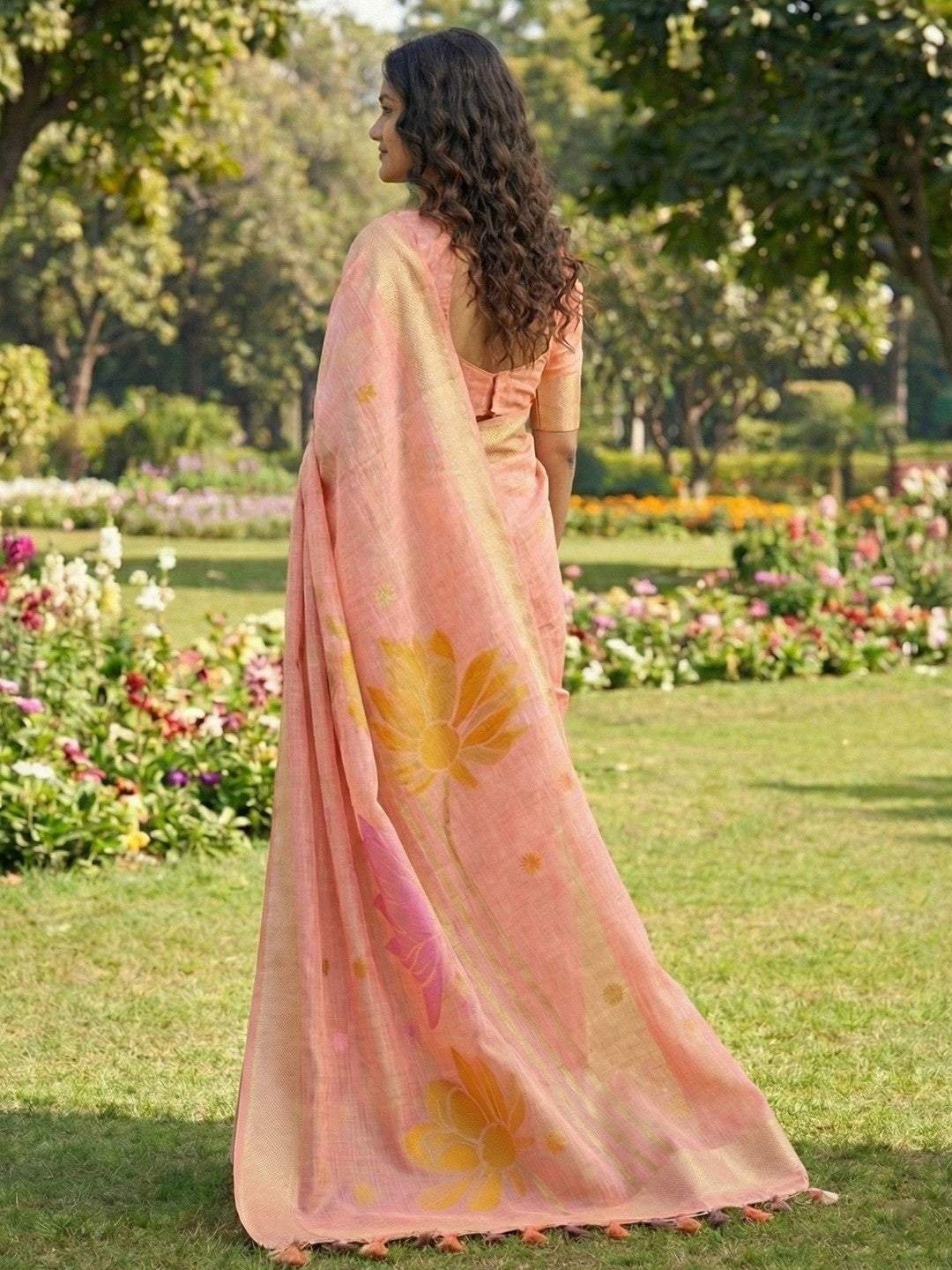 Refreshing Peach Linen Cotton Saree Highlighted With Delicate Floral Weaving & Tassel Pallu - Image 3