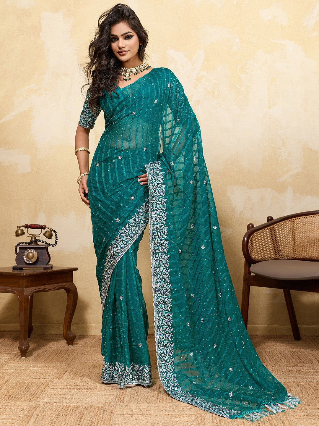 Elegant Teal Chiffon Saree Adorned With Floral Embroidery & Shimmering Swarovski Work - Image 1