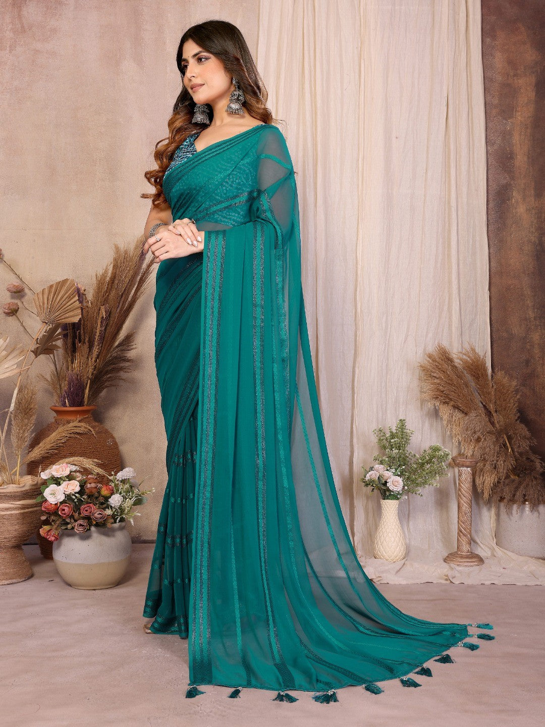Elegant Teal Zari Striped Weaving Georgette Saree Highlighted With Tassel Pallu - Image 3