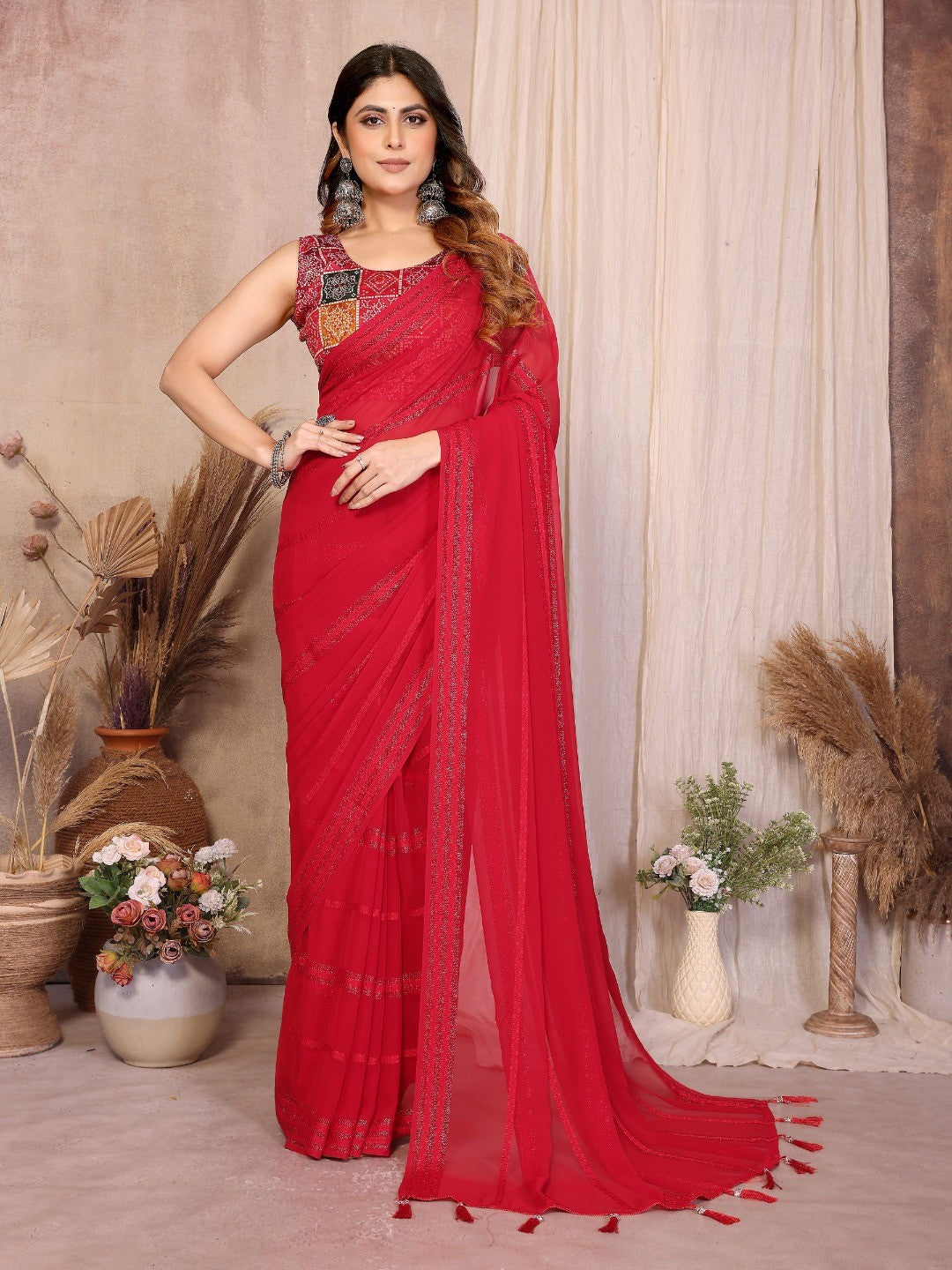 Elegant Red Zari Striped Weaving Georgette Saree Highlighted With Tassel Pallu - Image 1