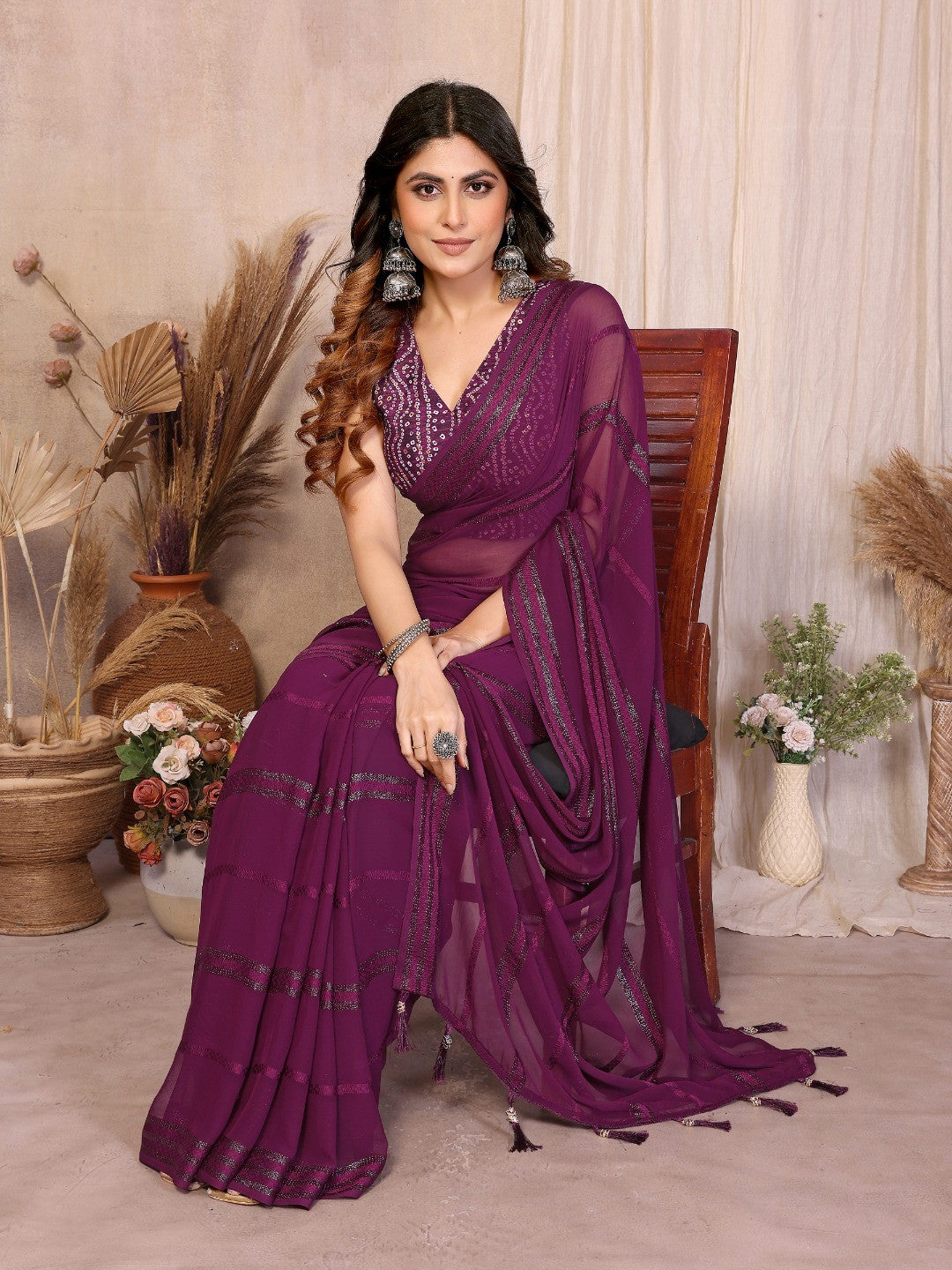 Elegant Wine Zari Striped Weaving Georgette Saree Highlighted With Tassel Pallu - Image 2