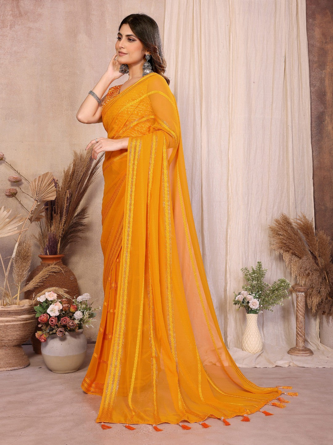 Elegant Mustard Zari Striped Weaving Georgette Saree Highlighted With Tassel Pallu - Image 3