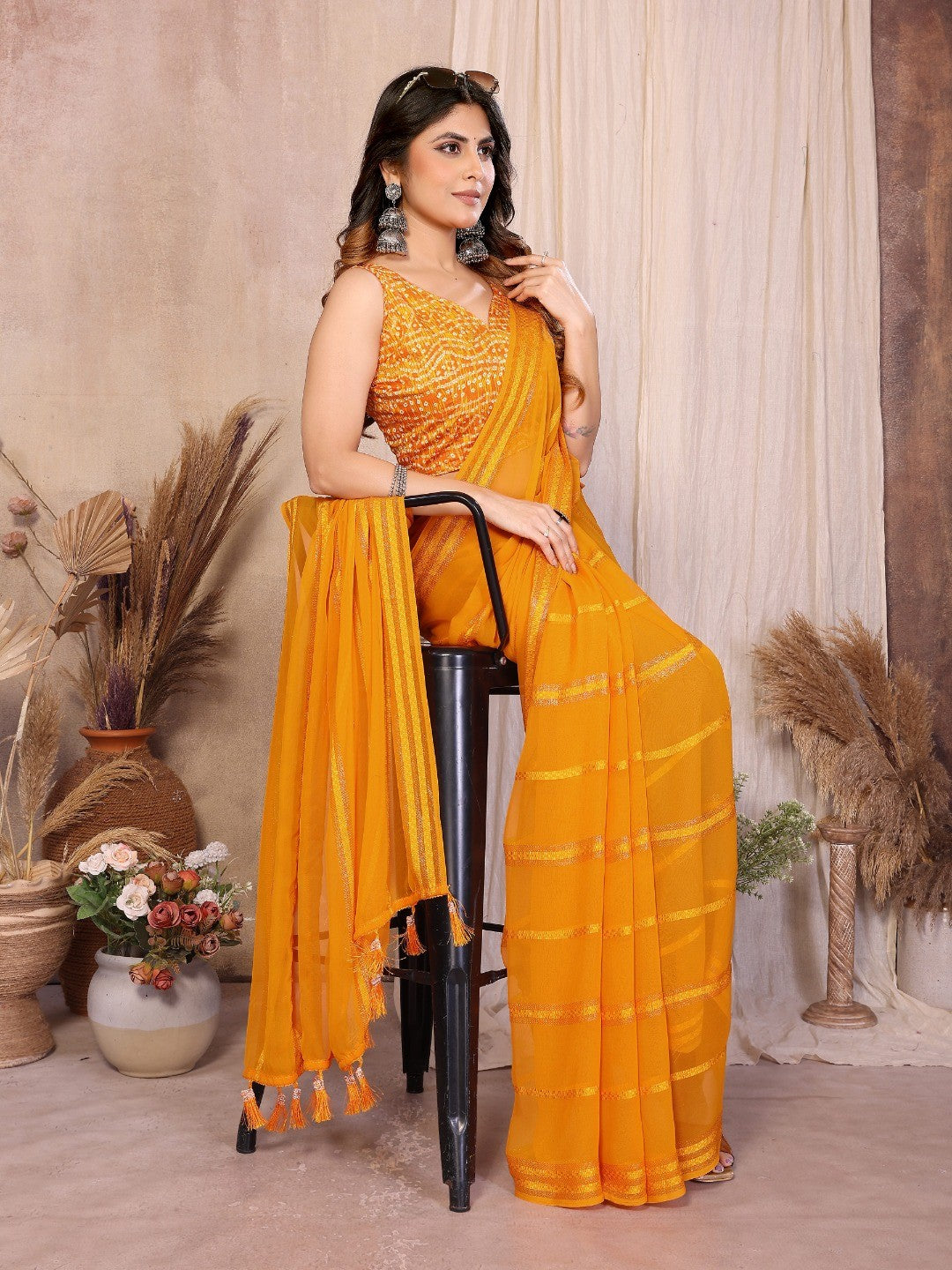 Elegant Mustard Zari Striped Weaving Georgette Saree Highlighted With Tassel Pallu - Image 2