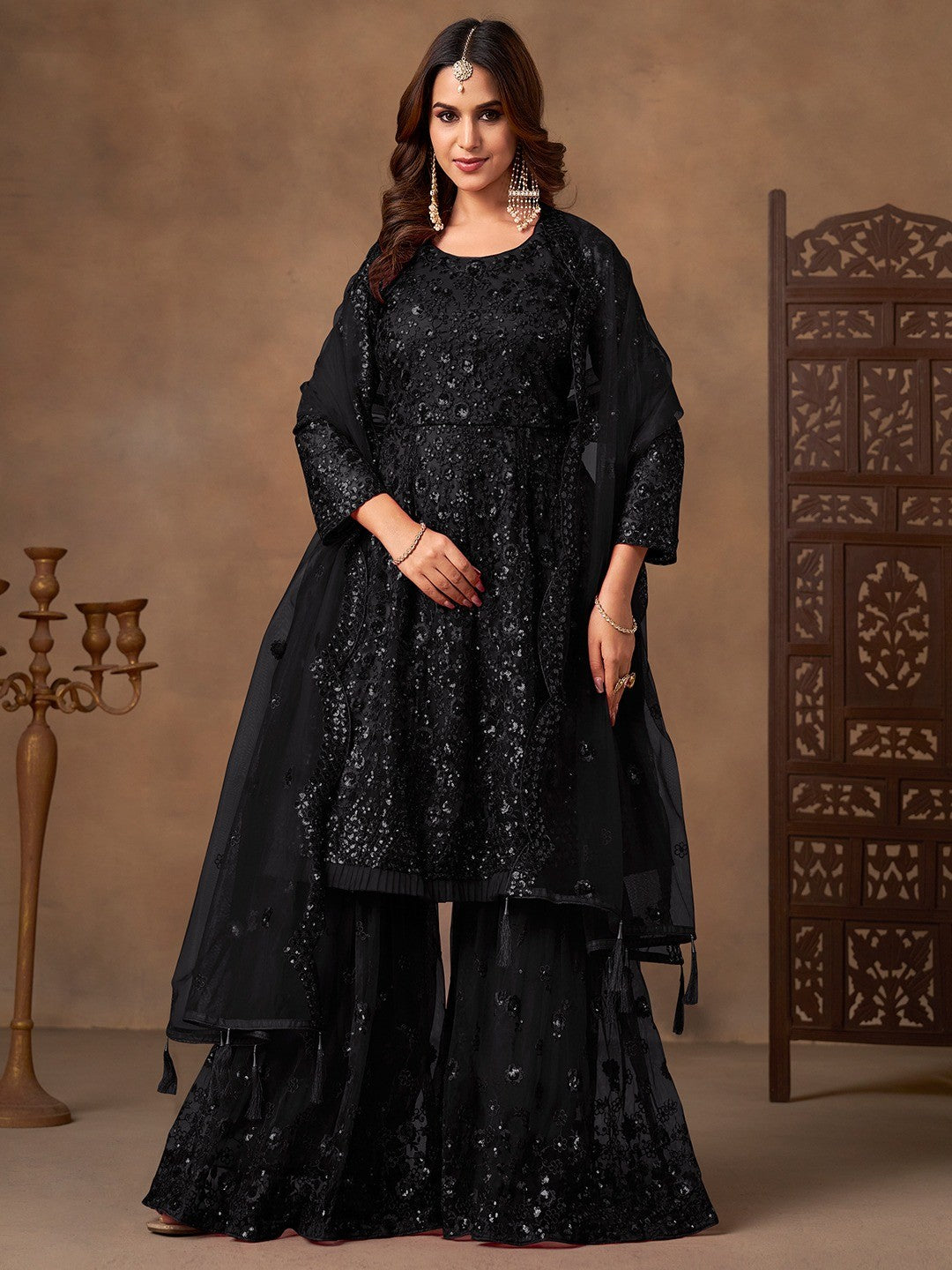 Black Net Embroidered Semi Sticthed Sharara Suit Set with Timeless Embroidery Design - Image 1
