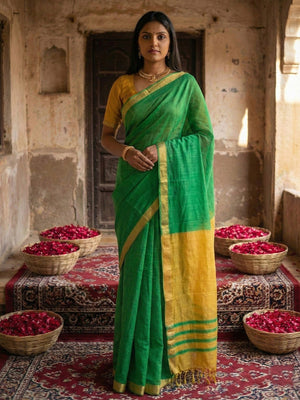 Elegant Green Solid Cotton Blend Saree Highlighted By Woven Border & Tassel Pallu - Image 1