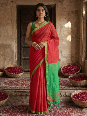 Elegant Cherry Red Solid Cotton Blend Saree Highlighted By Woven Border & Tassel Pallu - Image 1