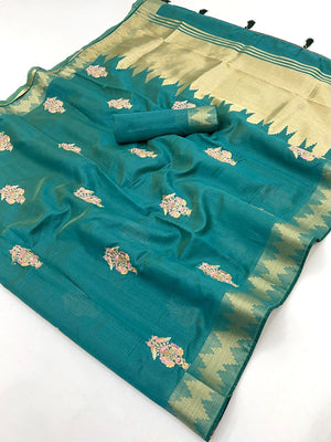 Refreshing Teal Cotton Blend Saree Highlighted By Intricate Floral Embroidery & Zari Weaving - Image 2