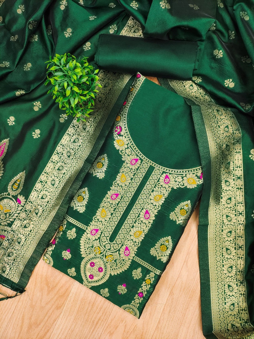 Luxurious Bottle Green Banarasi Silk Dress Material Showcasing Rich Floral Zari Weaving Design - Image 1