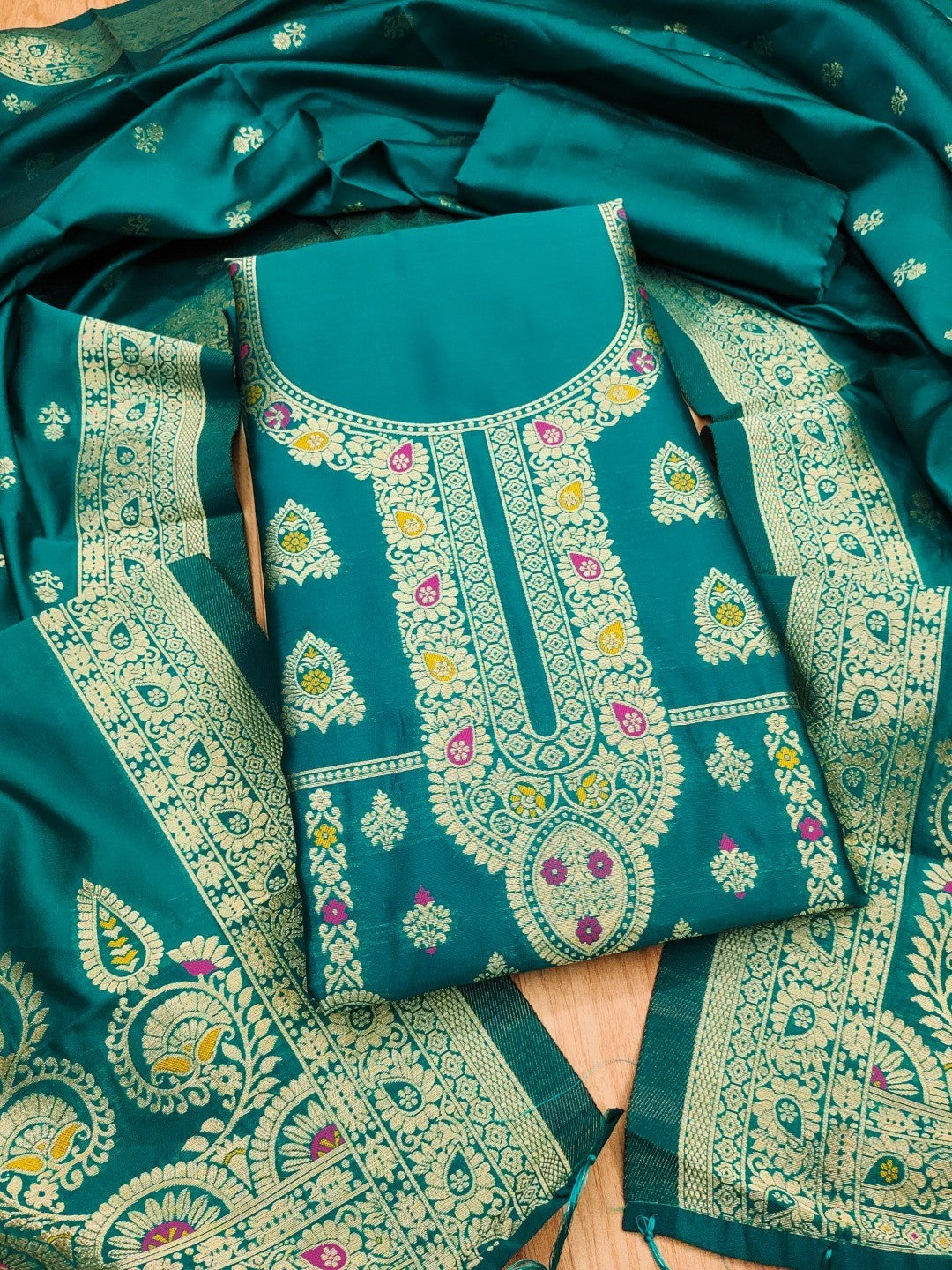 Luxurious Rama Blue Banarasi Silk Dress Material Showcasing Rich Floral Zari Weaving Design - Image 1
