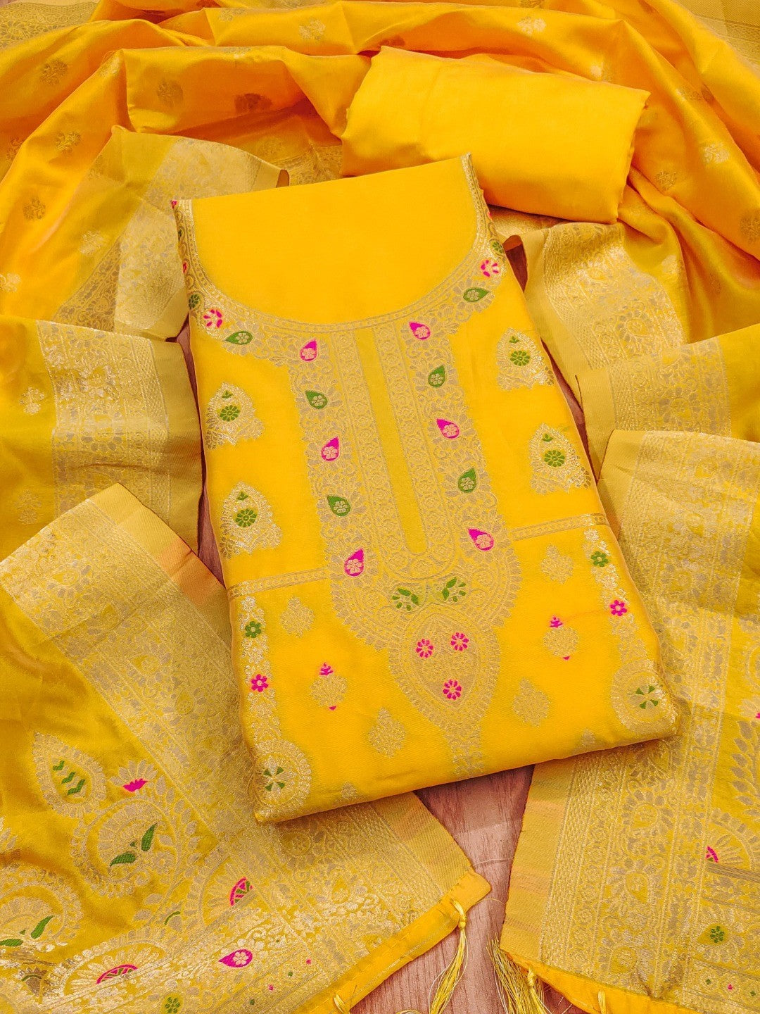 Luxurious Yellow Banarasi Silk Dress Material Showcasing Rich Floral Zari Weaving Design - Image 1