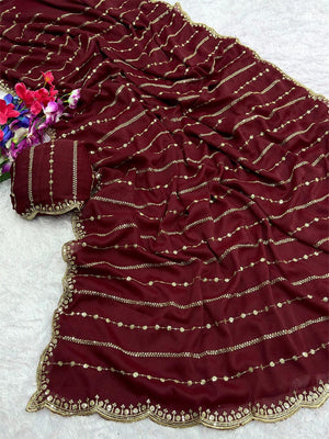 Timeless Maroon Striped Pattern Georgette Saree Accentuated With Elegant Sequins Embroidery Work - Image 1