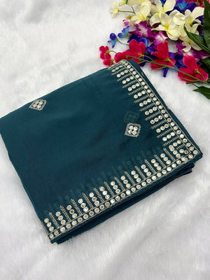Charming Teal Blue Georgette Saree With Delicate Sequins Embroidery & A Beautiful Border - Image 2