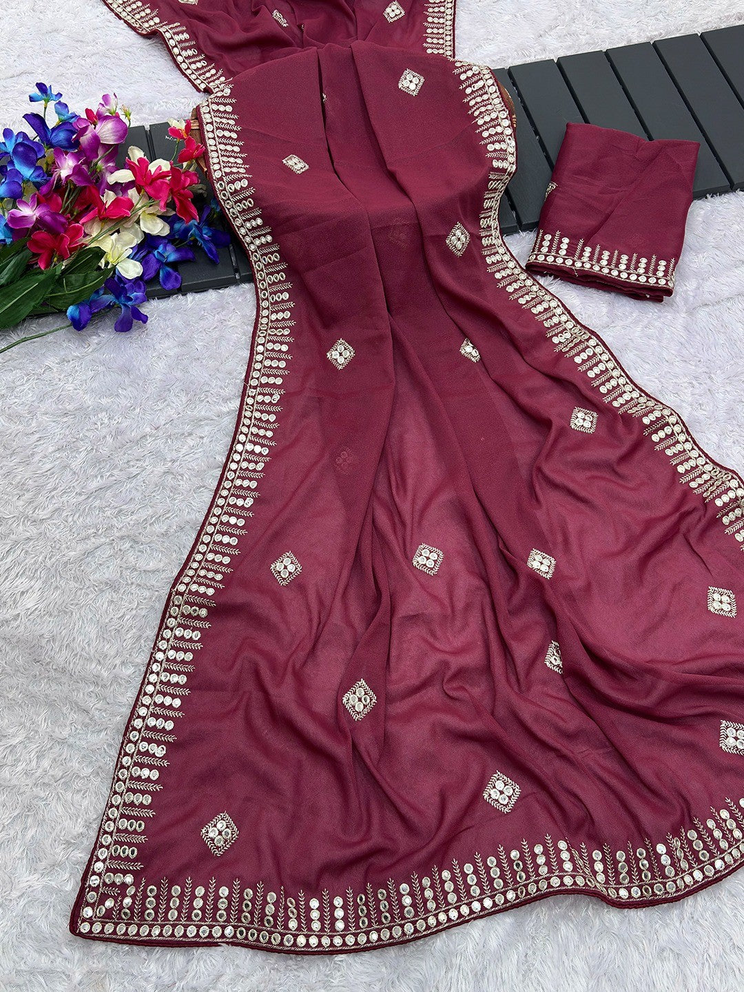 Charming Maroon Georgette Saree With Delicate Sequins Embroidery & A Beautiful Border - Image 1