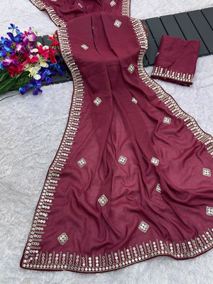 Charming Maroon Georgette Saree With Delicate Sequins Embroidery & A Beautiful Border - Image 1