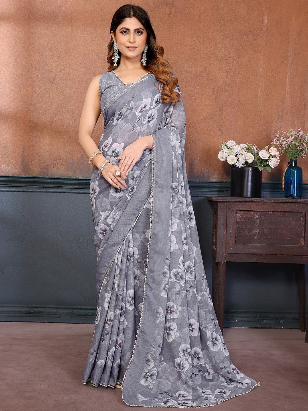 Elegant Gery Floral Printed Georgette Saree Enhanced With Delicate Lace Border Work - Image 1