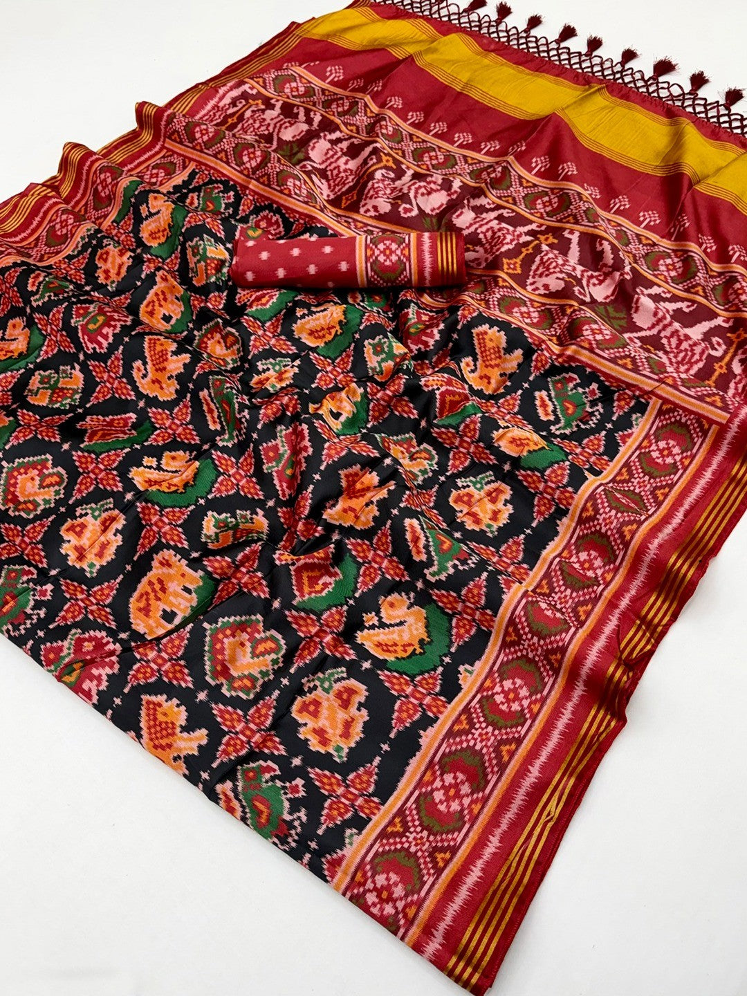 Exquisite Black Patola Print Handloom Silk Saree with Handcrafted Tassel Detailing - Image 2