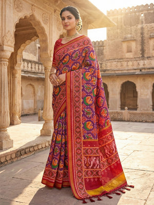 Exquisite Purple Patola Print Handloom Silk Saree with Handcrafted Tassel Detailing - Image 1