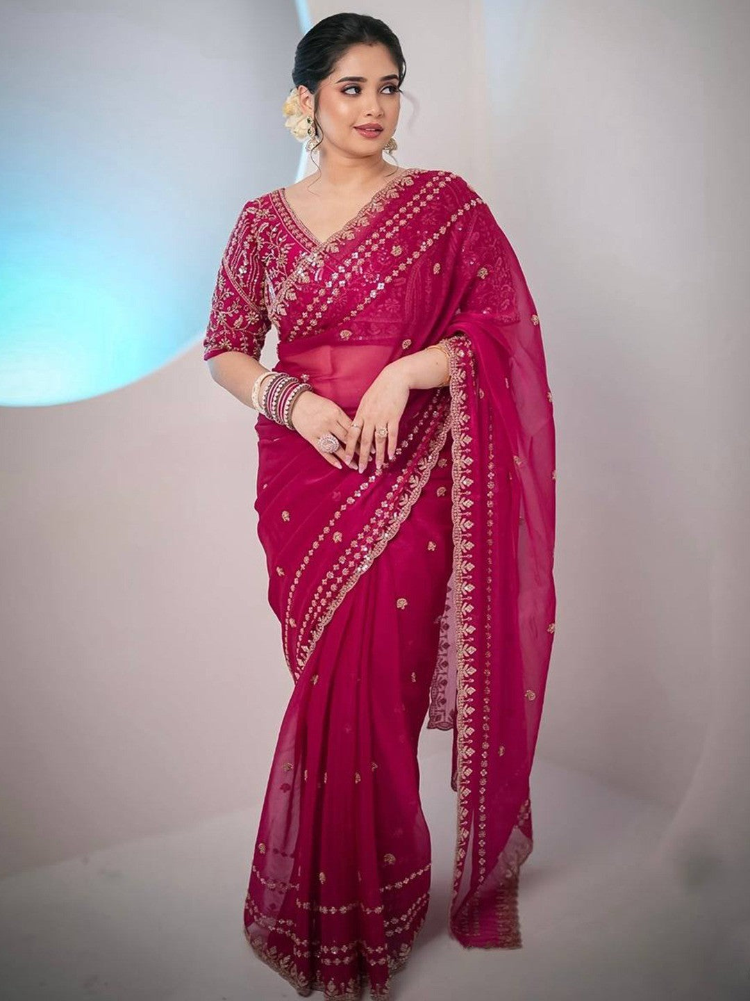 Luxurious Rani Pink Floral Zari Embroidered Satin Saree Accented With Fine Sequins Work - Image 1