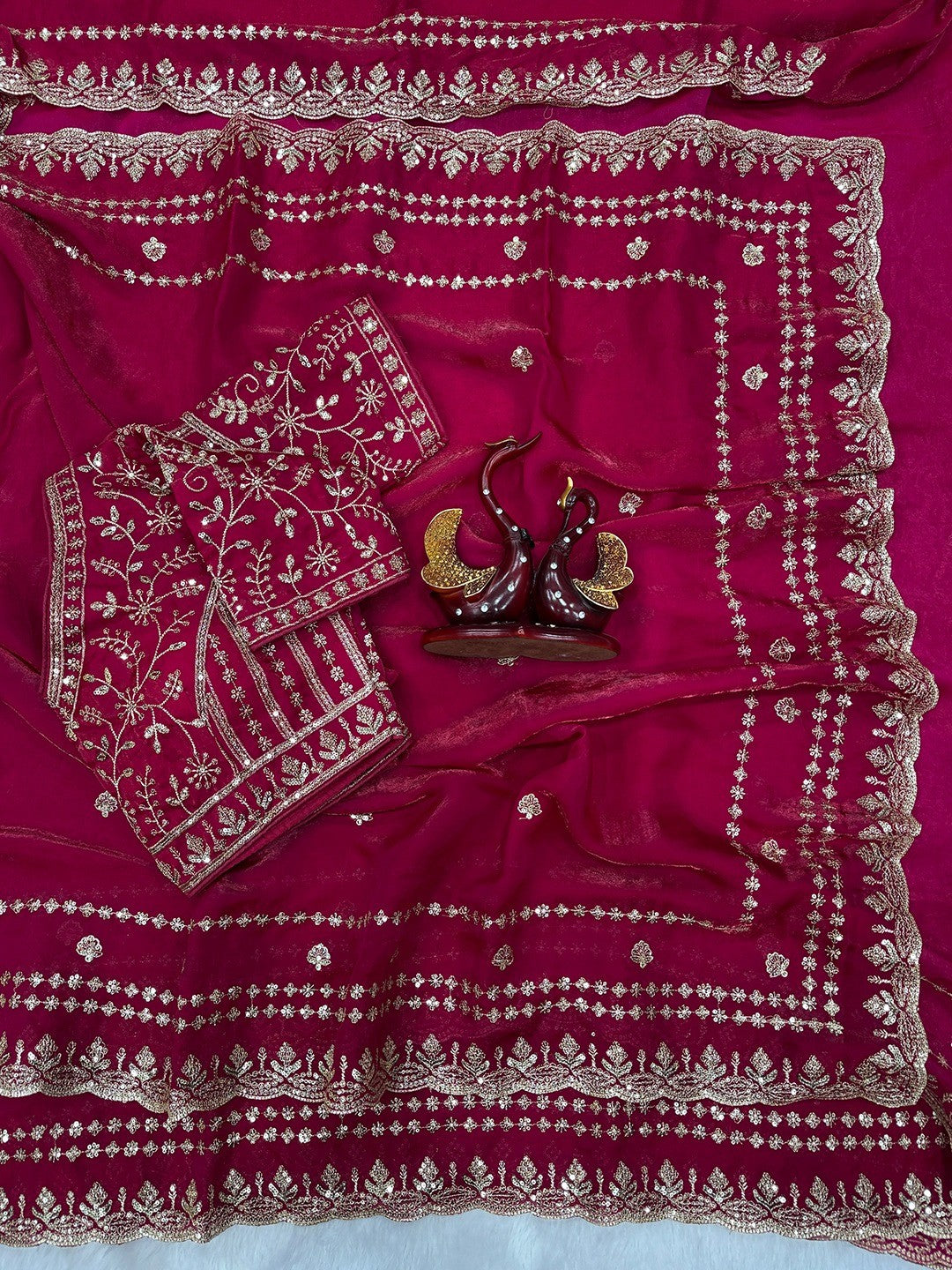 Luxurious Rani Pink Floral Zari Embroidered Satin Saree Accented With Fine Sequins Work - Image 4