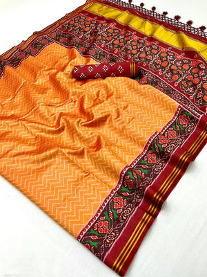 Traditional Orange Patola Print Handloom Silk Saree with Pallu Tassel Detailing - Image 2