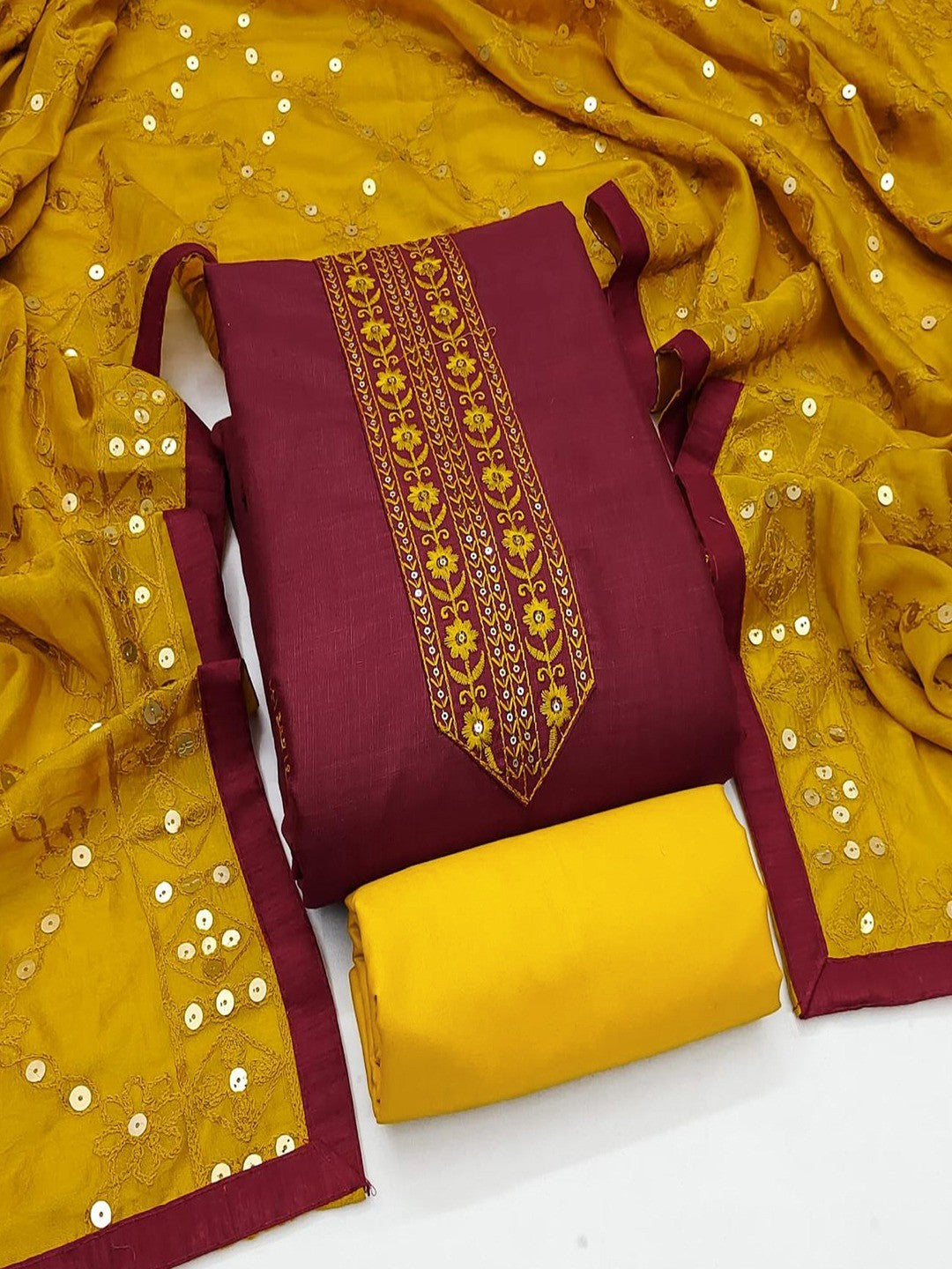 Elegant Maroon Cotton Blend Dress Material Adorned With Floral Embroidery & Delicate Sequins Work - Image 1