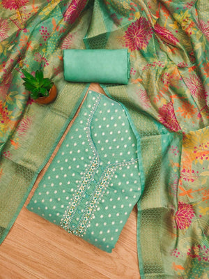 Premium Turquoise Woven Shimmer Dress Material Enhanced With Delicate Moti Beads & Stone Handwork - Image 1