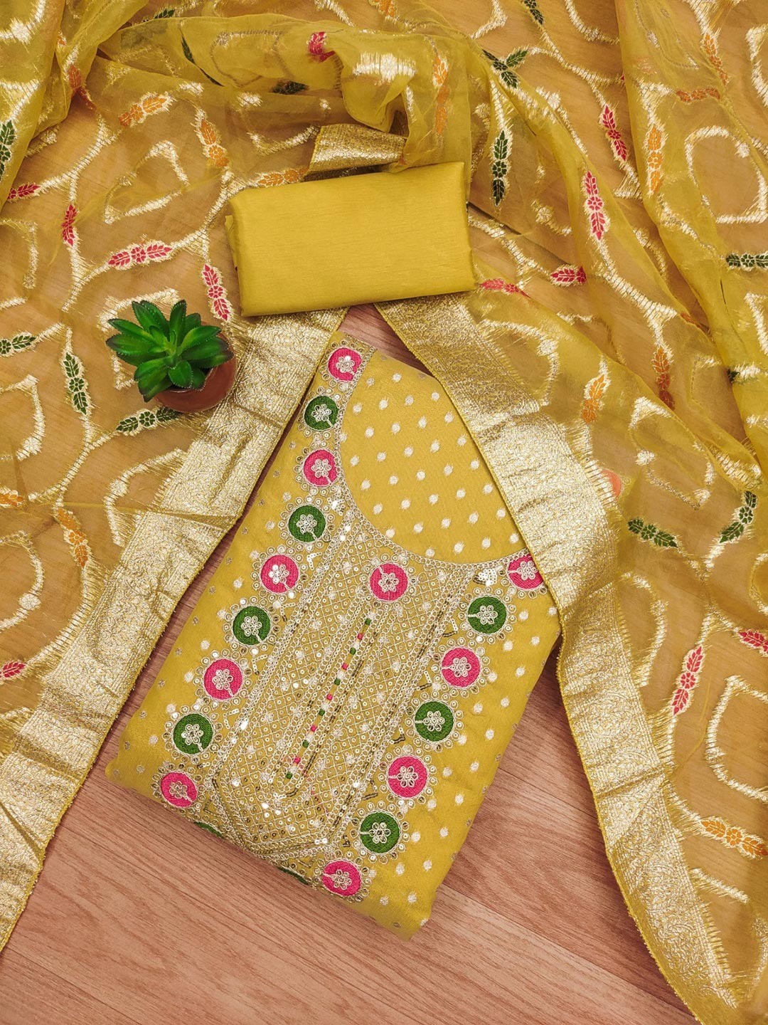 Graceful Mustard Floral Weaving Shimmer Dress Material Adorned With Cording Sequins Embroidery - Image 1