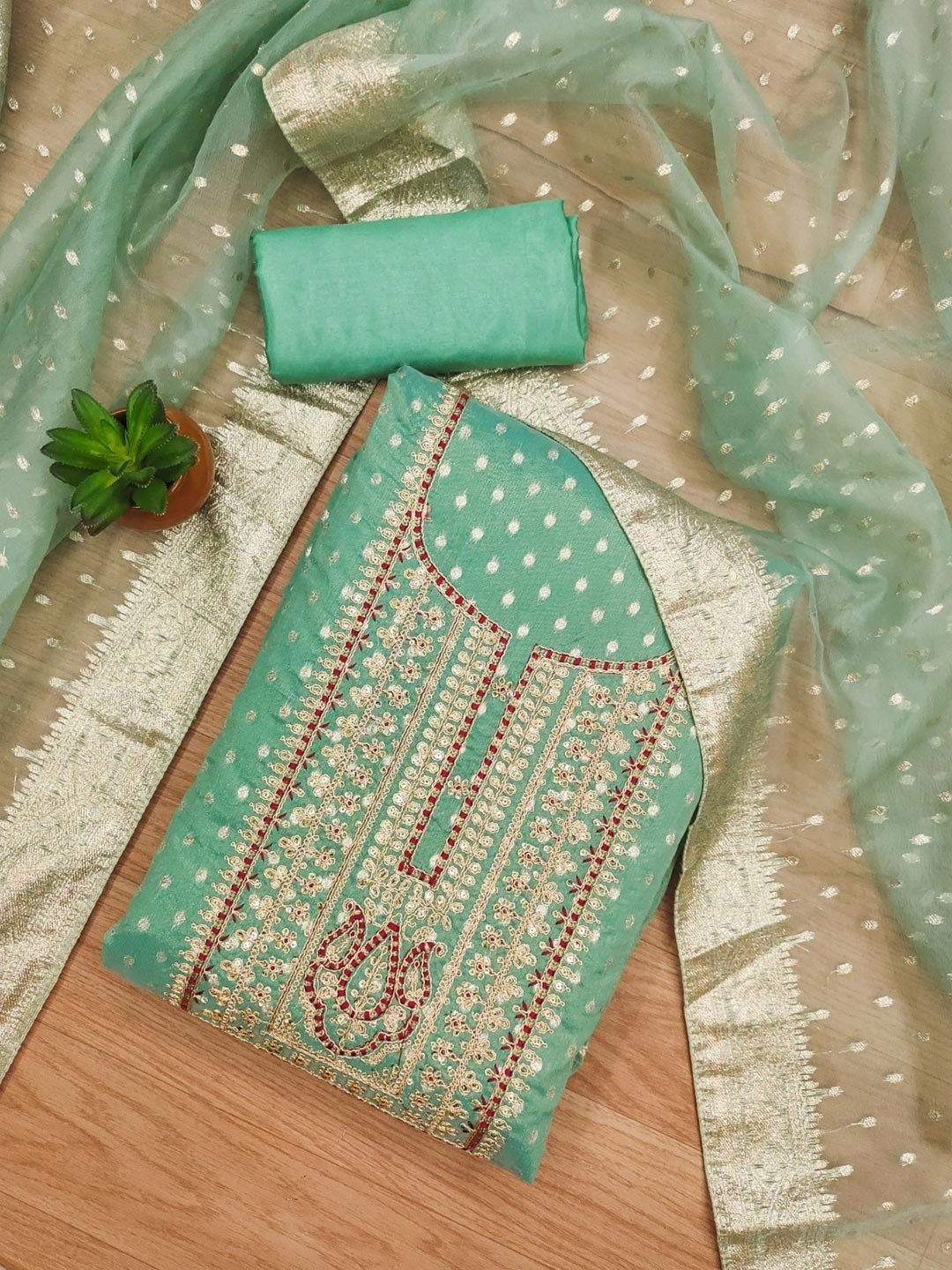 Sophisticated Turquoise Floral Cording Sequins Embroidery With Weaving Shimmer Dress Material - Image 1