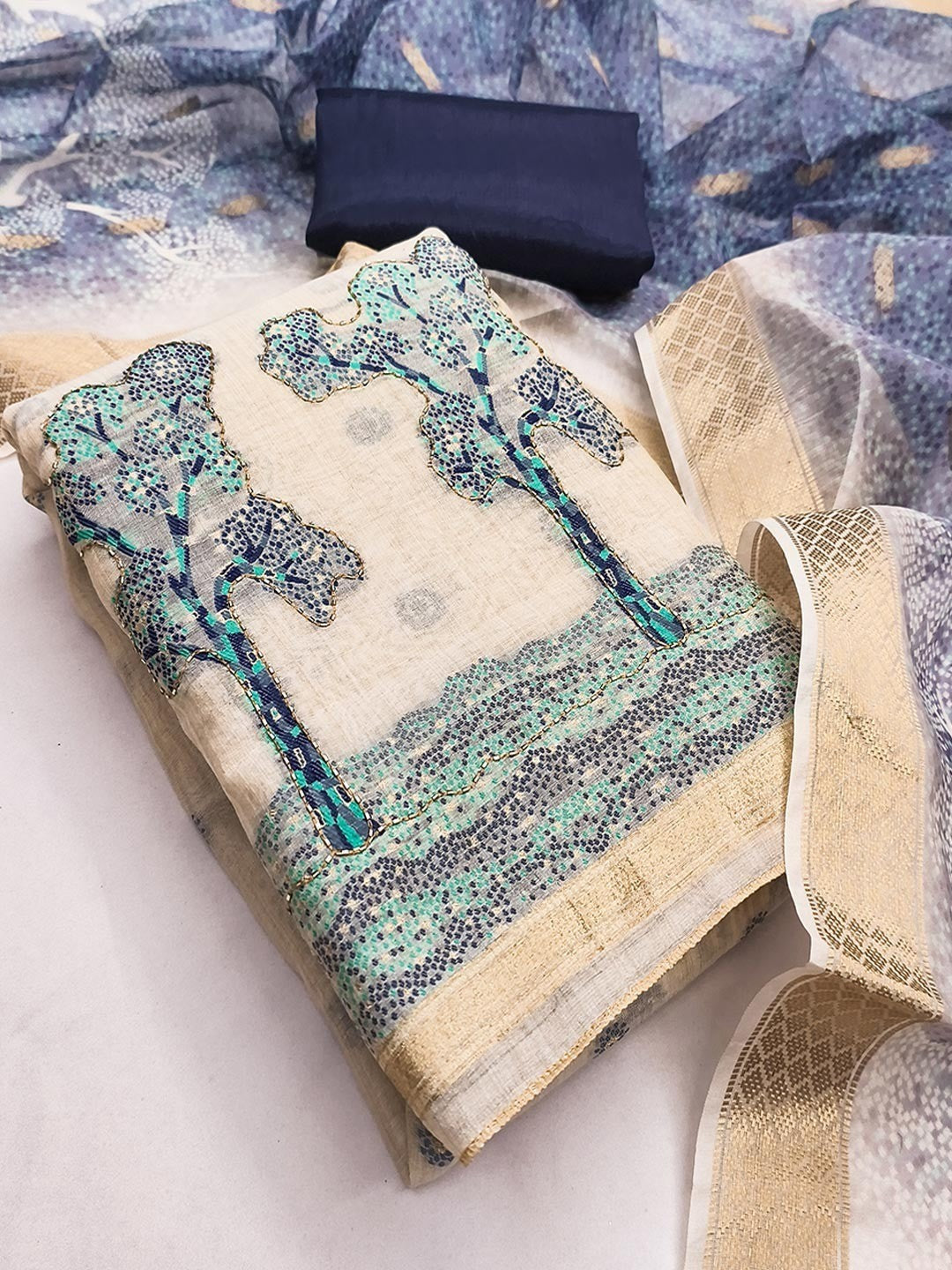Designer Chikoo & Navy Blue Floral Woven Jacquard Dress Material With Elegant Daman Handwork - Image 1