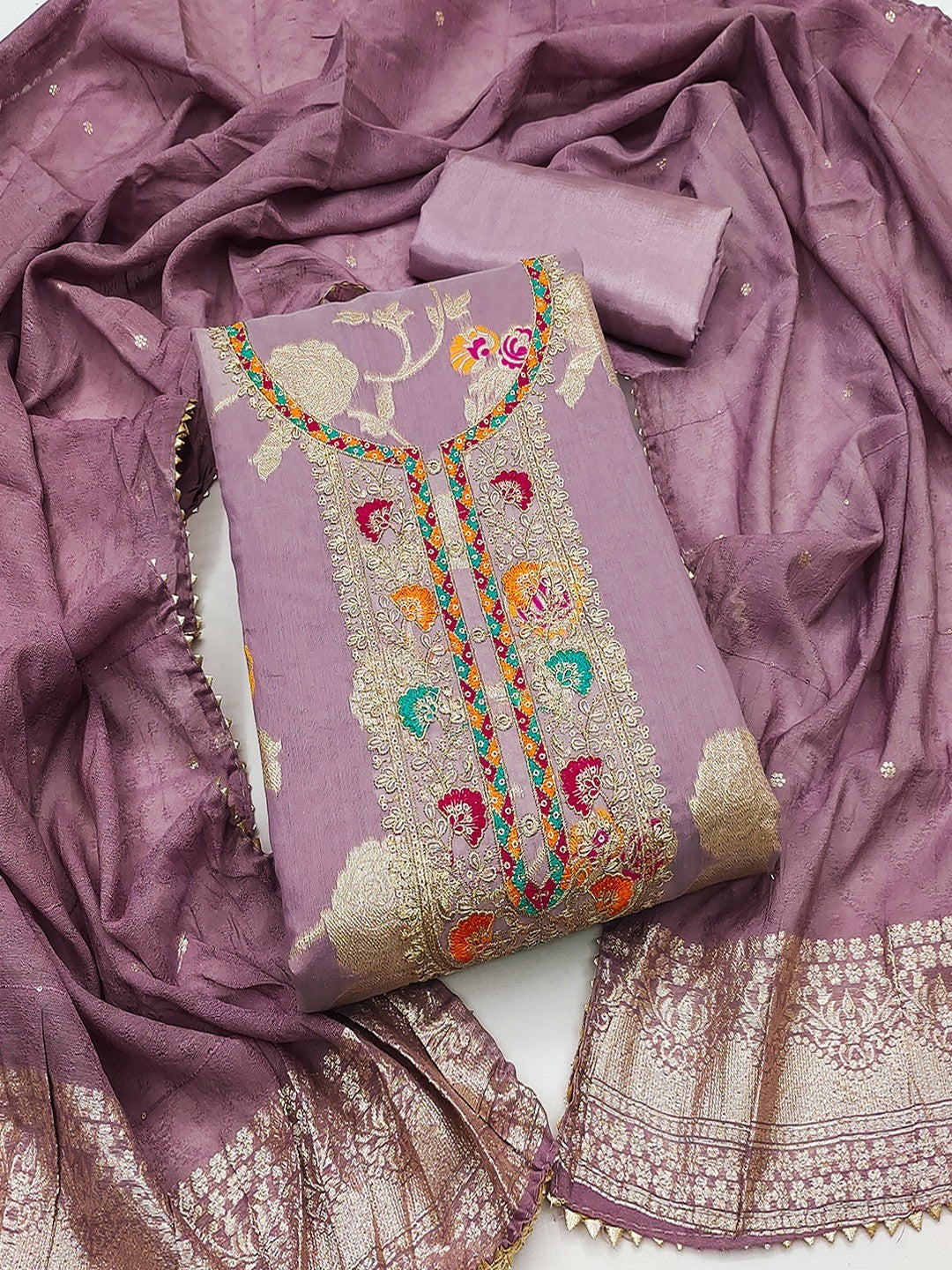 Mauve Elegant Modal Jacquard Dress Material Adorned with Intricate Zari Weaving - Image 1